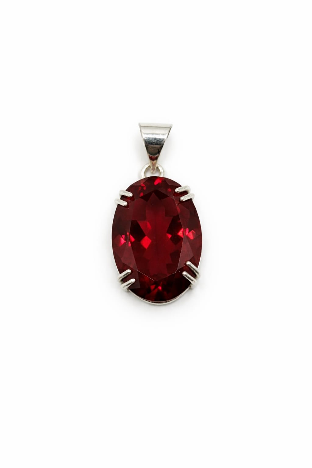 Elegant Oval Deep Red Gemstone Pendant in Polished Silver Setting